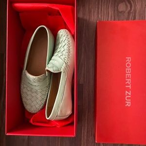 Robert zur and Cole hasn’t shoes